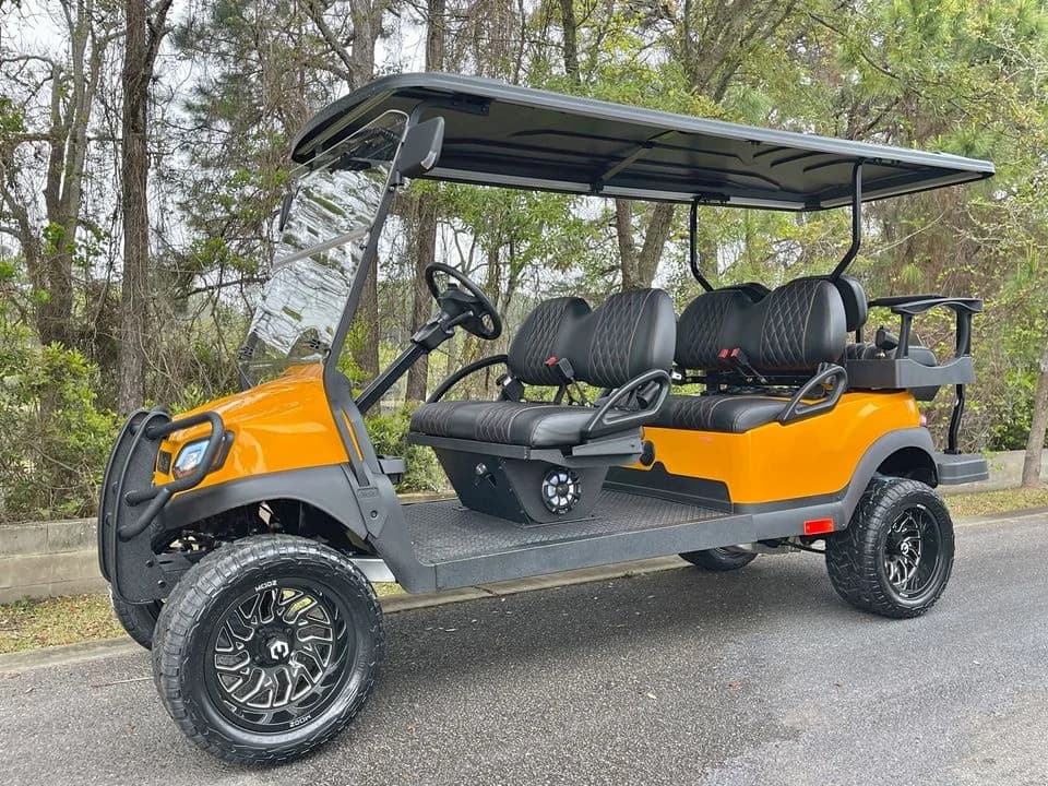 Orange 6 Passenger Gas Club Car with Bluetooth Audio System — Pre-owned 6-Seater Petrol Golf Cart (PGC-740) | Prestige Golf Carts South Africa